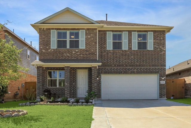 traditional-style home featuring a front lawn, a garage, brick siding, and driveway