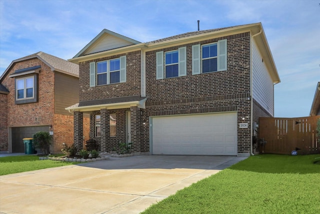 traditional-style home featuring a front yard, brick siding, concrete driveway, and an attached garage