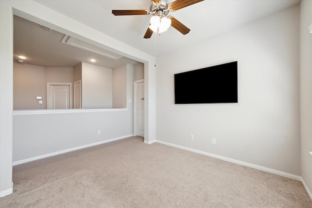 unfurnished room featuring recessed lighting, ceiling fan, baseboards, and carpet