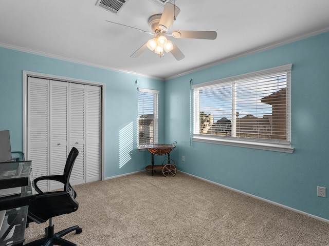 office area with visible vents, carpet floors, ceiling fan, and crown molding