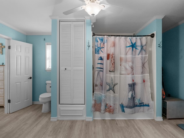 full bath with wood finished floors, a closet, and ornamental molding