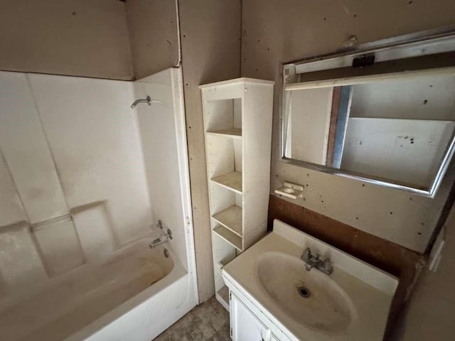 bathroom with vanity and bathing tub / shower combination