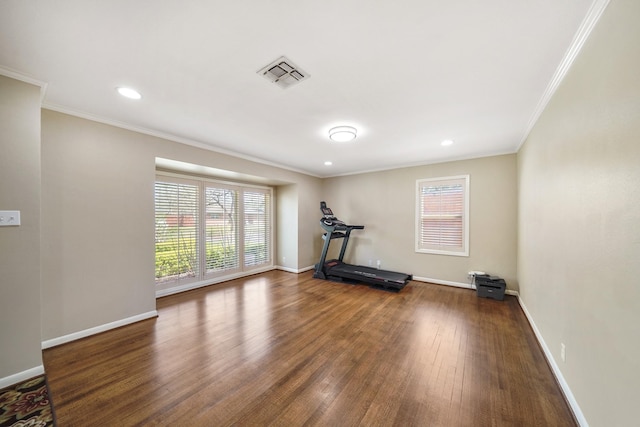 workout area with visible vents, crown molding, baseboards, recessed lighting, and wood finished floors