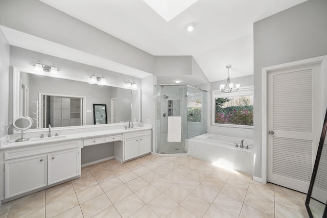 full bath featuring a garden tub, double vanity, a shower stall, and a sink