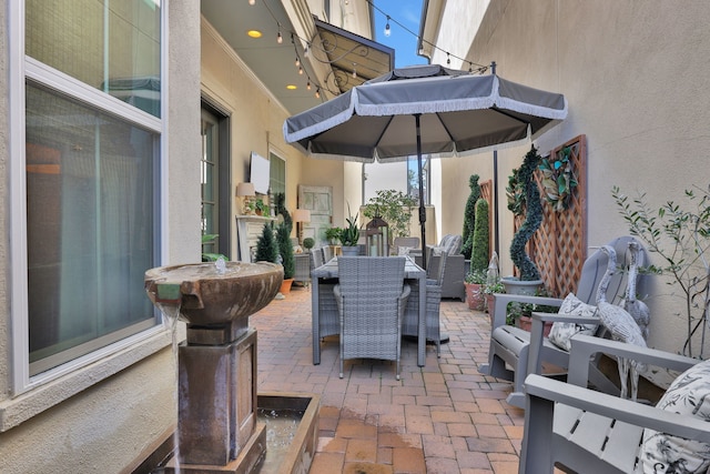 view of patio featuring outdoor dining space