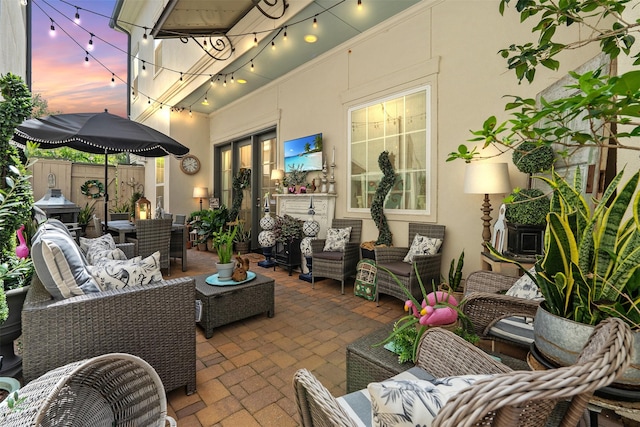 view of patio / terrace featuring outdoor lounge area, outdoor dining area, and fence