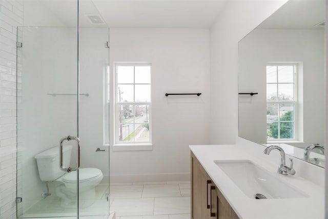 full bath with visible vents, baseboards, toilet, a stall shower, and vanity