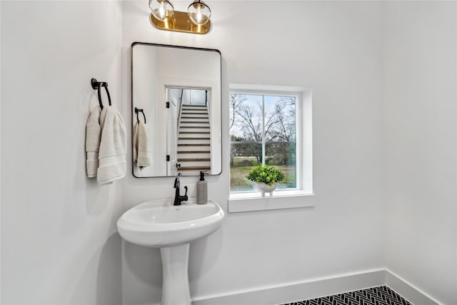 bathroom with baseboards