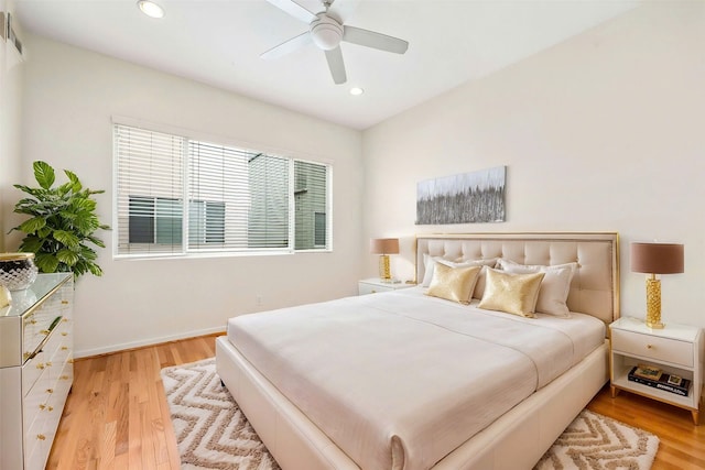 bedroom featuring recessed lighting, light wood-style floors, baseboards, and ceiling fan