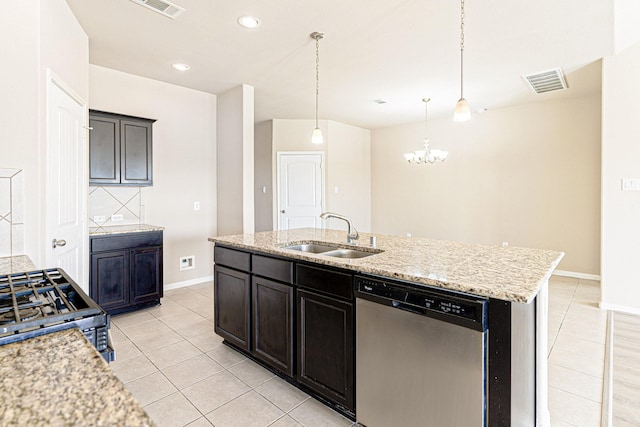 kitchen featuring visible vents, an island with sink, a sink, an inviting chandelier, and dishwasher