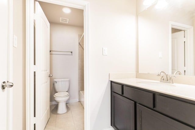 bathroom featuring vanity, tile patterned floors, toilet, and visible vents