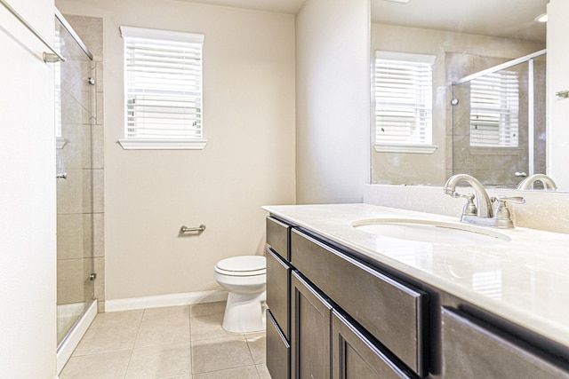 full bath with baseboards, toilet, a shower stall, and tile patterned flooring