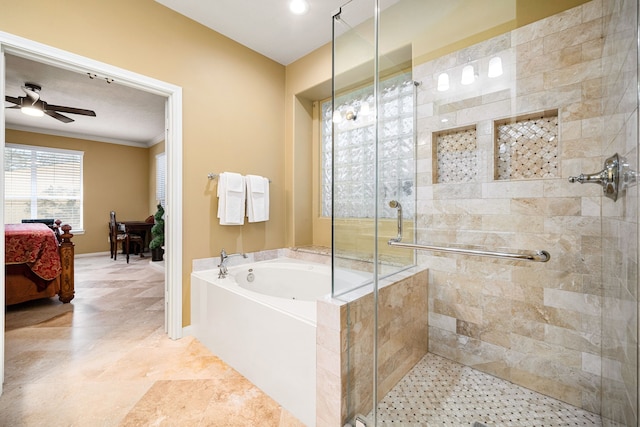 ensuite bathroom with connected bathroom, a garden tub, ceiling fan, and a shower stall