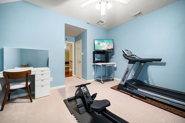 exercise area with visible vents, baseboards, carpet, and a ceiling fan