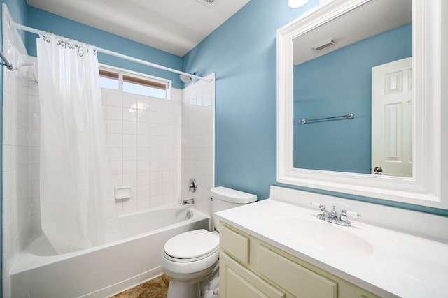 bathroom with visible vents, vanity, toilet, and shower / tub combo with curtain