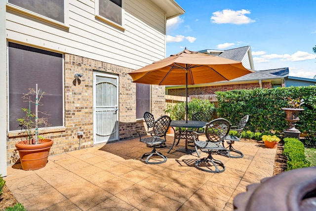 view of patio with outdoor dining space