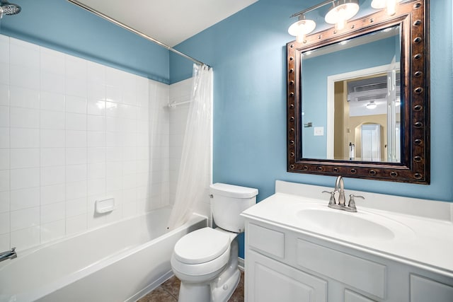 bathroom with vanity, toilet, and shower / bath combo with shower curtain