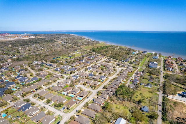 bird's eye view featuring a residential view and a water view