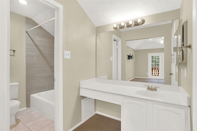 full bathroom featuring toilet, a ceiling fan, a textured ceiling, tile patterned flooring, and vanity