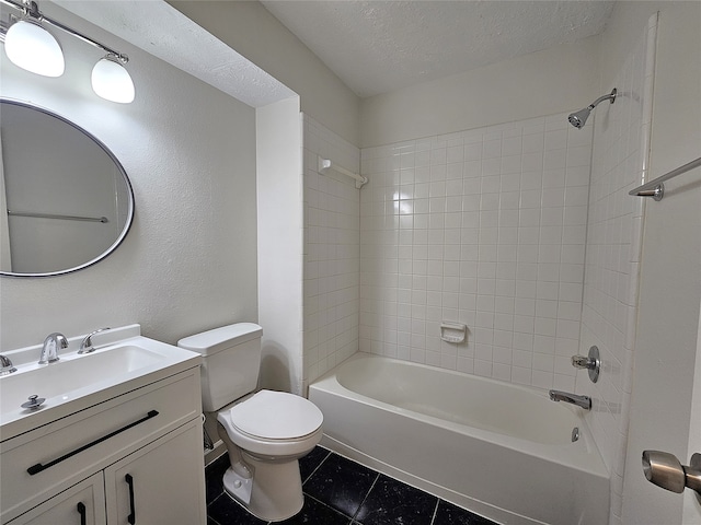 bathroom featuring vanity, tile patterned flooring, a textured ceiling, shower / tub combination, and toilet