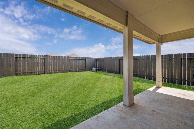 view of yard featuring a patio and a fenced backyard