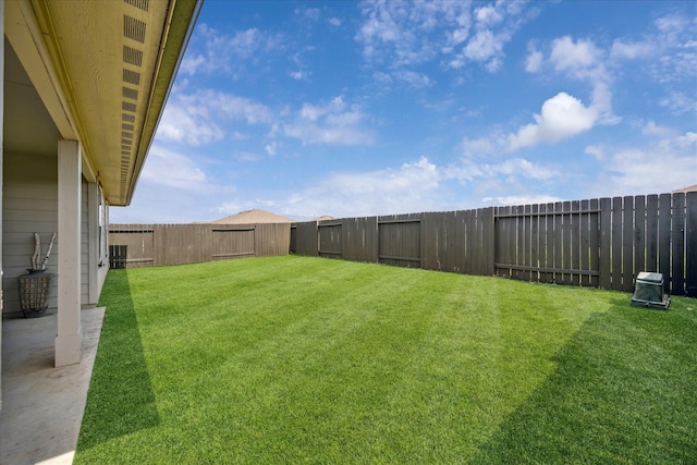 view of yard featuring a fenced backyard