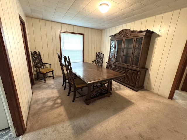 view of carpeted dining area