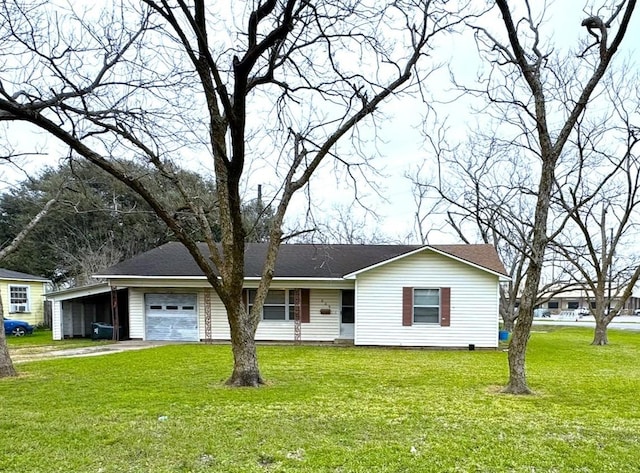 ranch-style house featuring driveway, a front lawn, and a garage