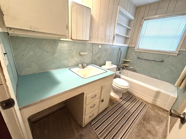 full bath featuring vanity, toilet, and a washtub