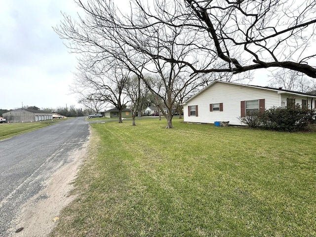 exterior space with dirt driveway