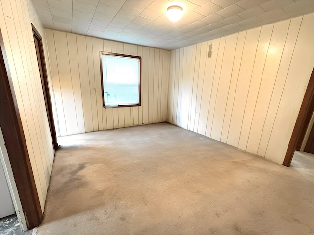 unfurnished room featuring light colored carpet