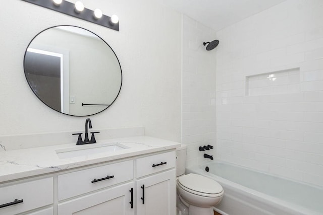 bathroom featuring toilet, vanity, and shower / tub combination