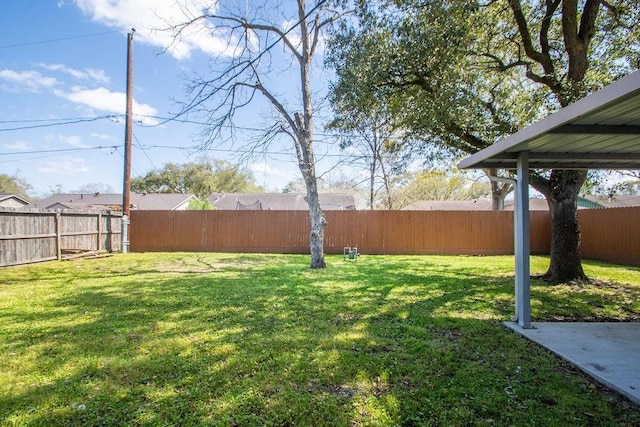 view of yard featuring a fenced backyard