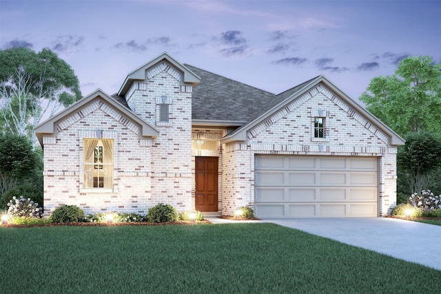 view of front of property with concrete driveway, an attached garage, brick siding, and a front lawn