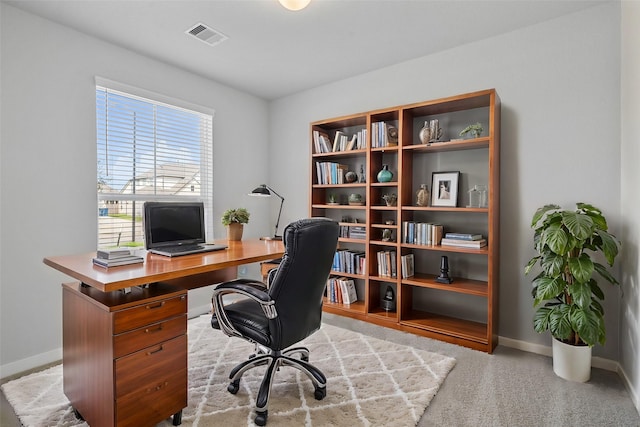 office with visible vents and baseboards