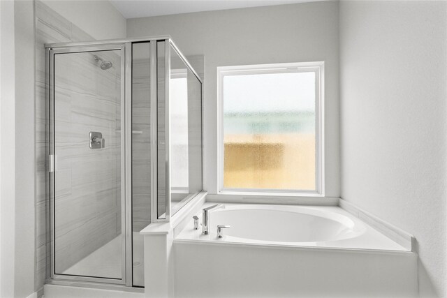 357 Spruce Oak Ln, Waller, TX 77484 - bathroom with a shower stall and a bath