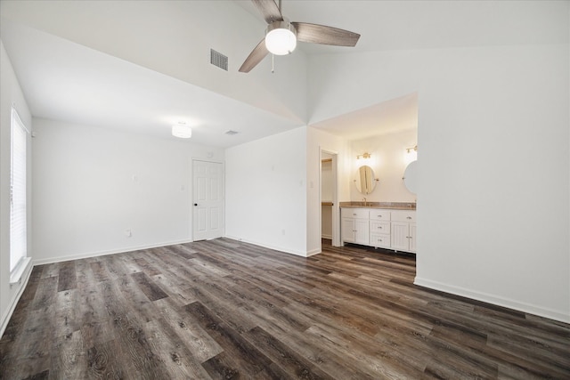2003 Long Barrel Ln, Missouri City, TX 77489 - unfurnished bedroom with visible vents, baseboards, and dark wood-style flooring