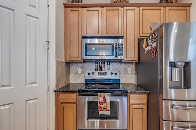 kitchen with decorative backsplash, brown cabinetry, and stainless steel appliances