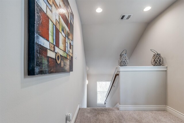 staircase featuring recessed lighting, visible vents, baseboards, and carpet flooring