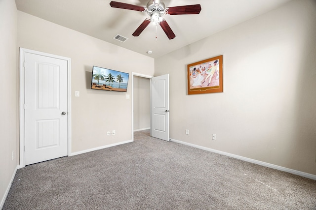 unfurnished bedroom featuring visible vents, ceiling fan, baseboards, and carpet floors