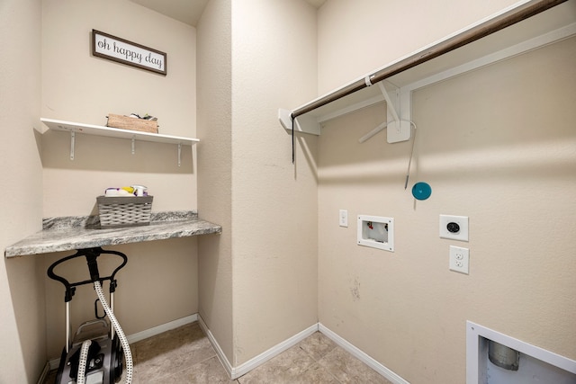 clothes washing area with laundry area, hookup for a washing machine, baseboards, and hookup for an electric dryer