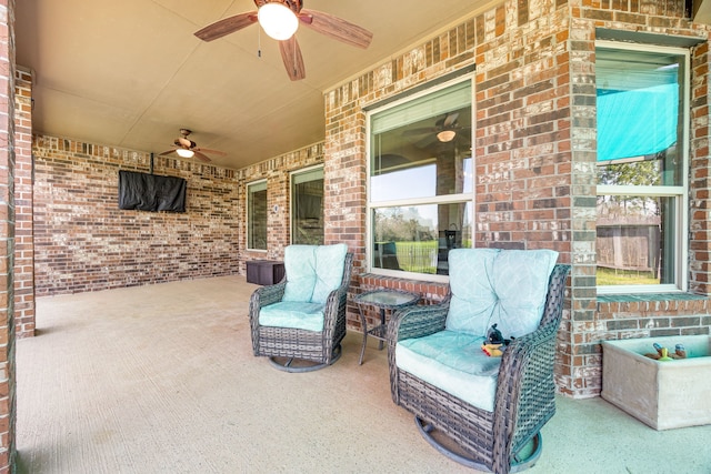 view of patio / terrace featuring a ceiling fan