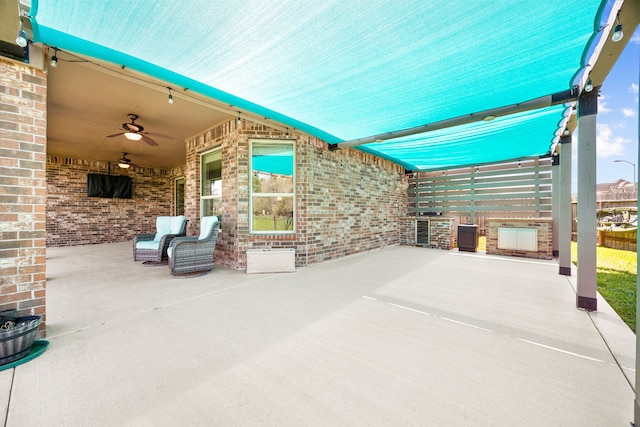 view of patio / terrace with a ceiling fan