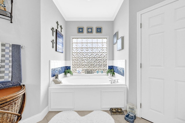 bathroom featuring a bath and ornamental molding