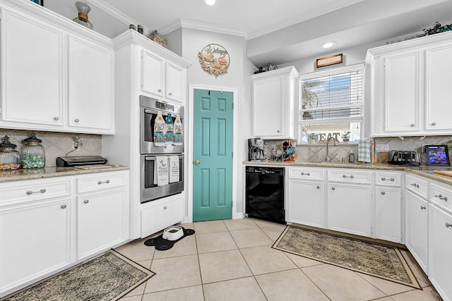 kitchen with light tile patterned floors, white cabinetry, stainless steel double oven, ornamental molding, and dishwasher