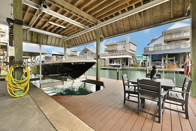 dock area featuring a water view and boat lift