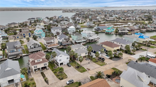 aerial view with a residential view and a water view