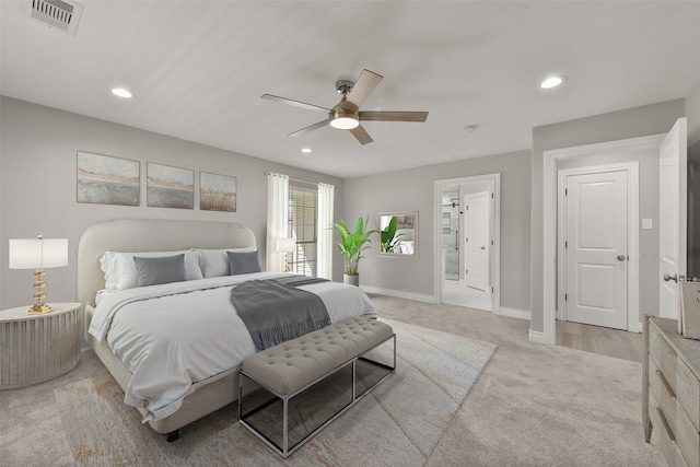 bedroom featuring light colored carpet, recessed lighting, visible vents, and baseboards