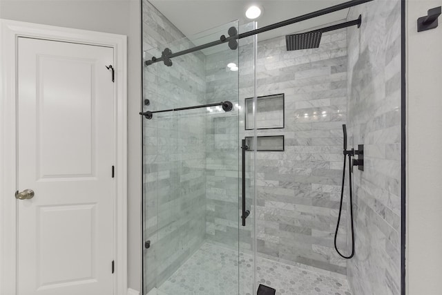 full bathroom with a shower stall