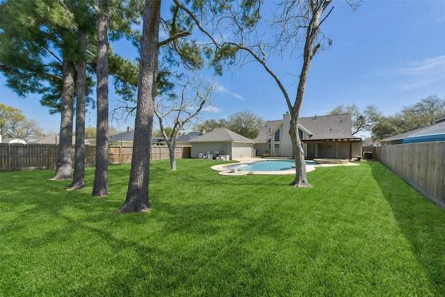 view of yard with a patio area, a fenced in pool, and a fenced backyard